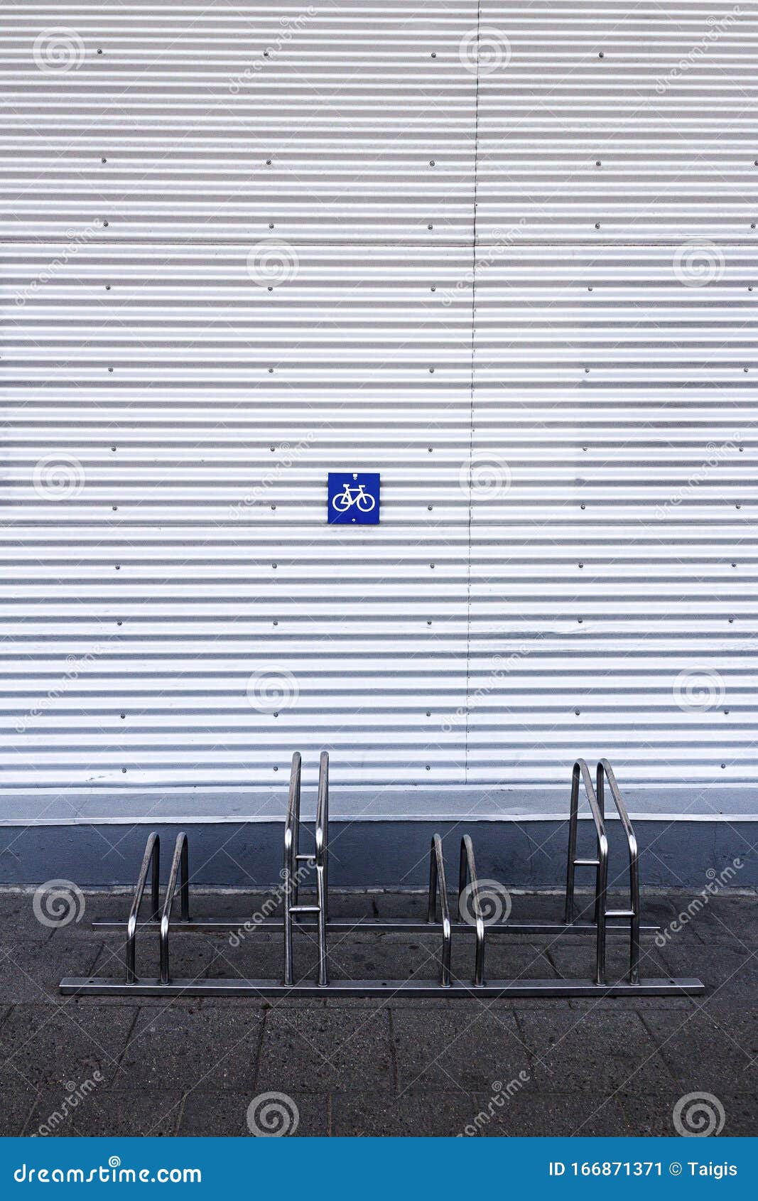 Iron Bike Rack by the Corrugated Iron Wall Stock Image Image of