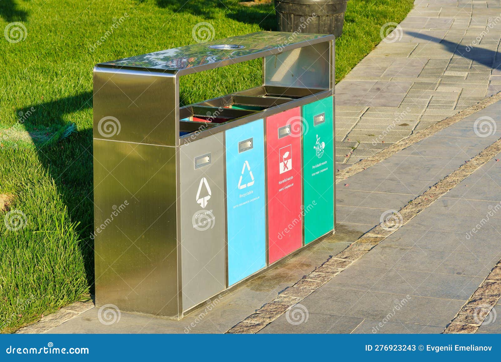 Iron Containers for Separate Waste Collection. Waste Recycling. Stock