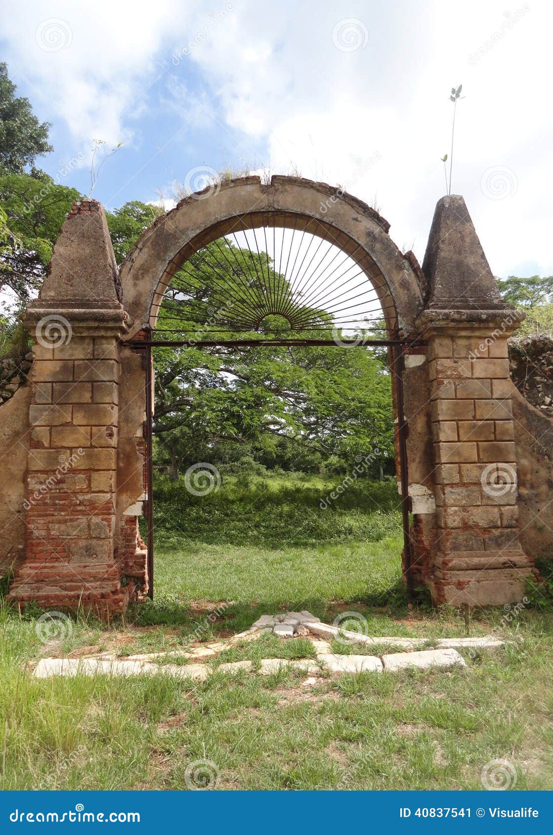 iron door and stone walls of colonial coffe plantation