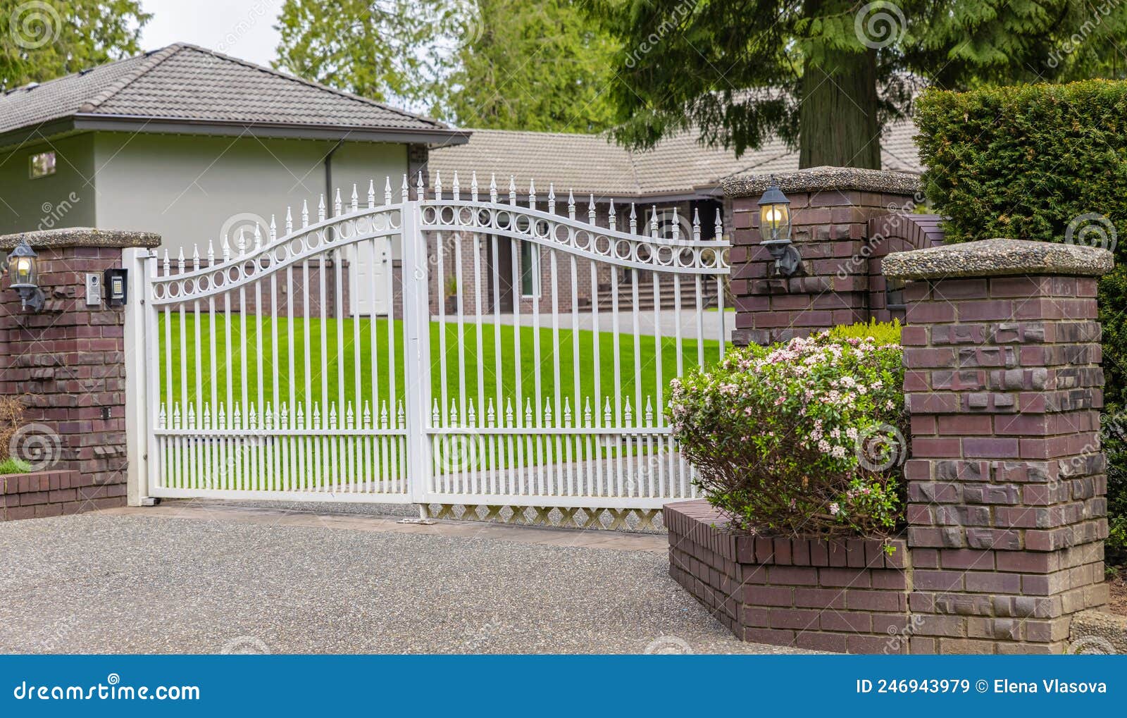 Iron Front Gate of a Luxury Home. Wrought Iron White Gate and ...