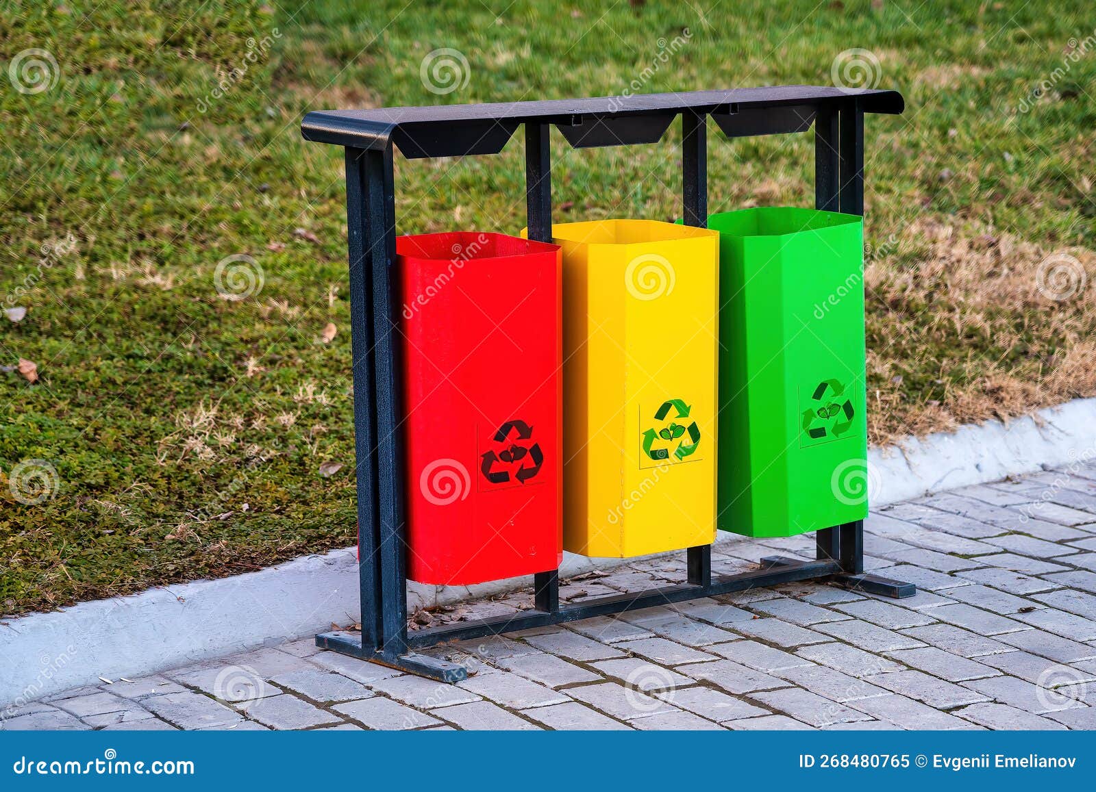 Iron Multicolored Containers for Separate Waste Collection. Stock
