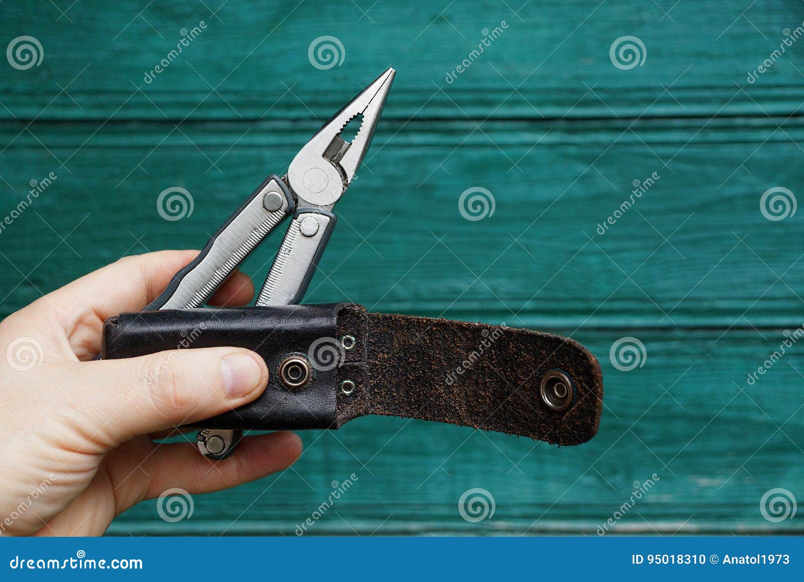 Iron Tool and Leather Case in Hand Stock Photo Image of hand, repair