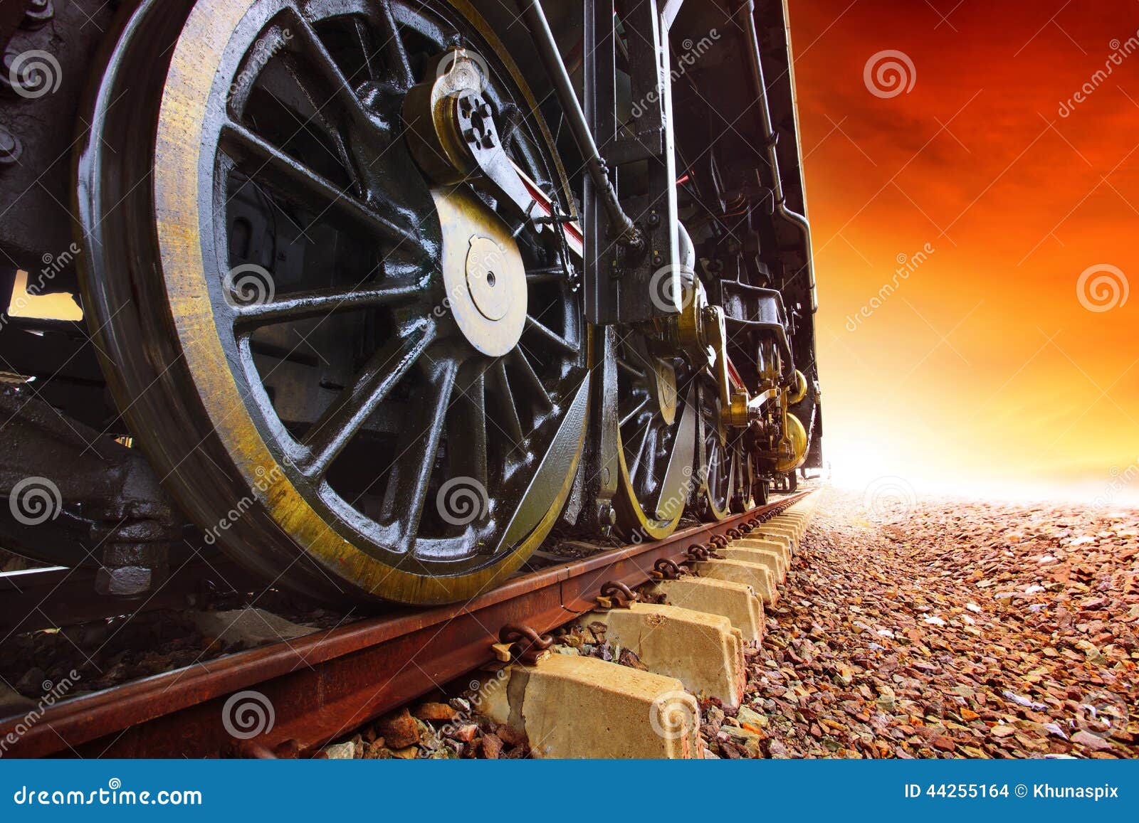 iron wheels of stream engine locomotive train on railways track