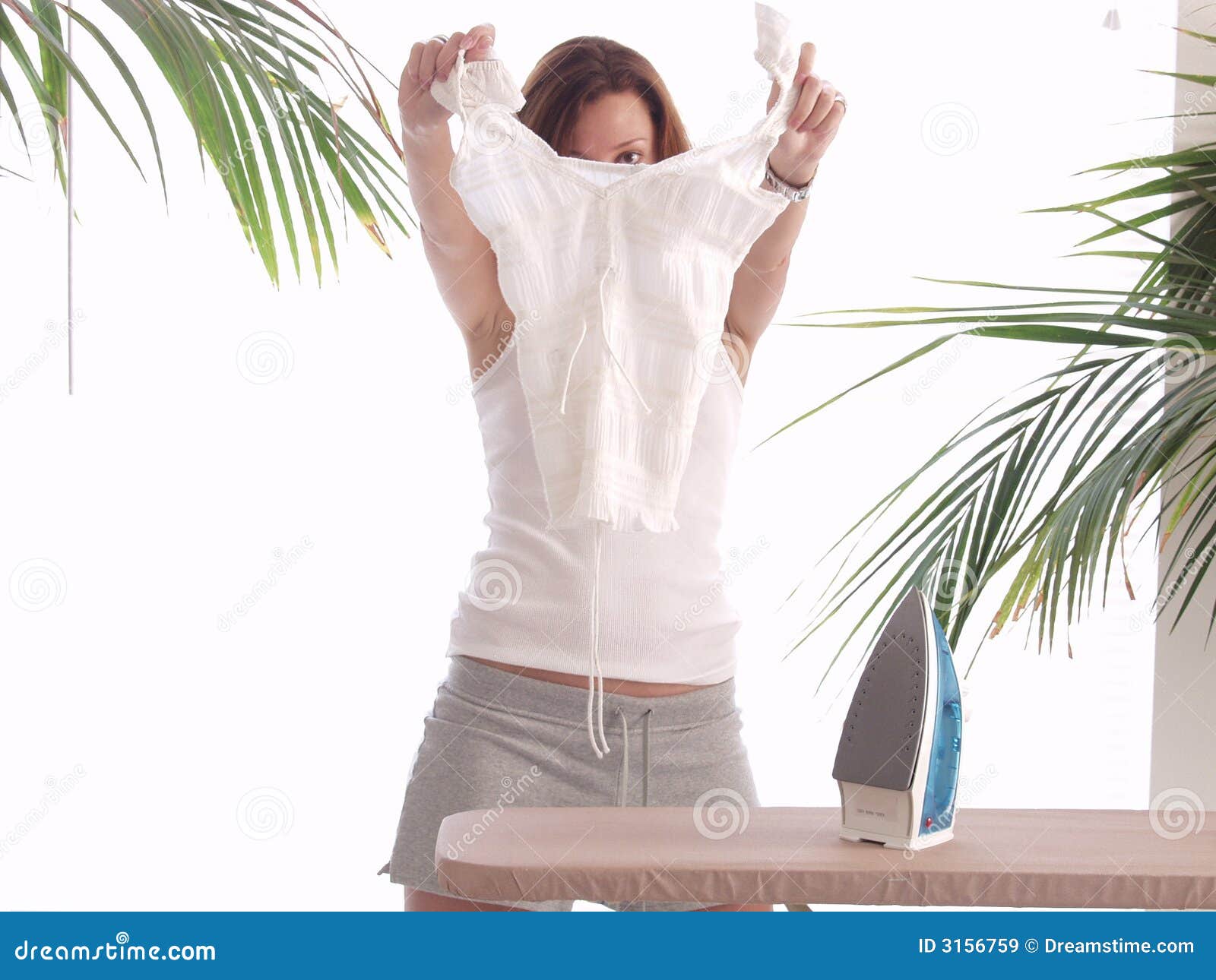 Ironing a blouse stock image. Image of blouse, maid, domestic 3156759