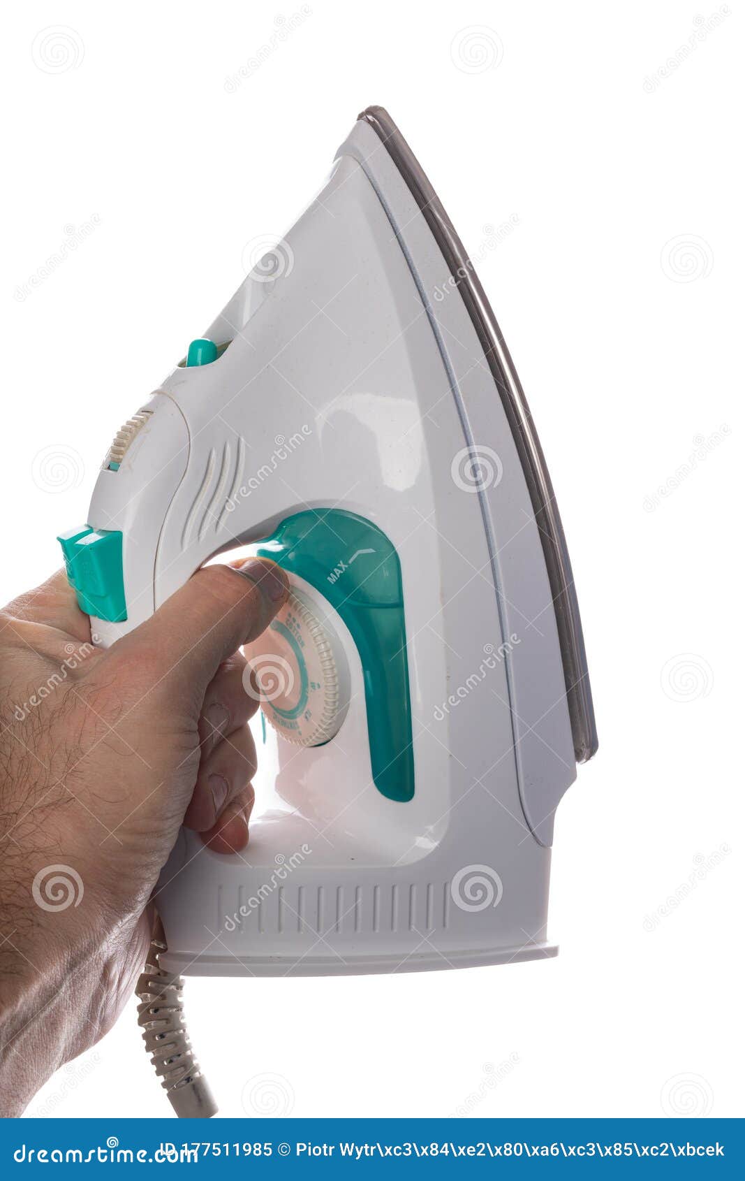 Ironing Iron Held in a Man S Hand. Ironing Accessories Stock Image