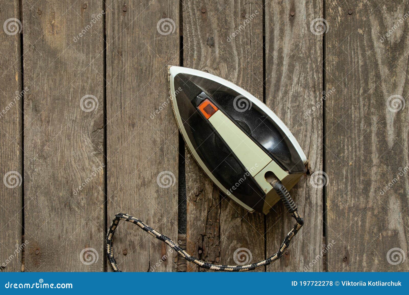 Ironing Iron Stands on a Wooden Table at Home, Iron on the Table Stock