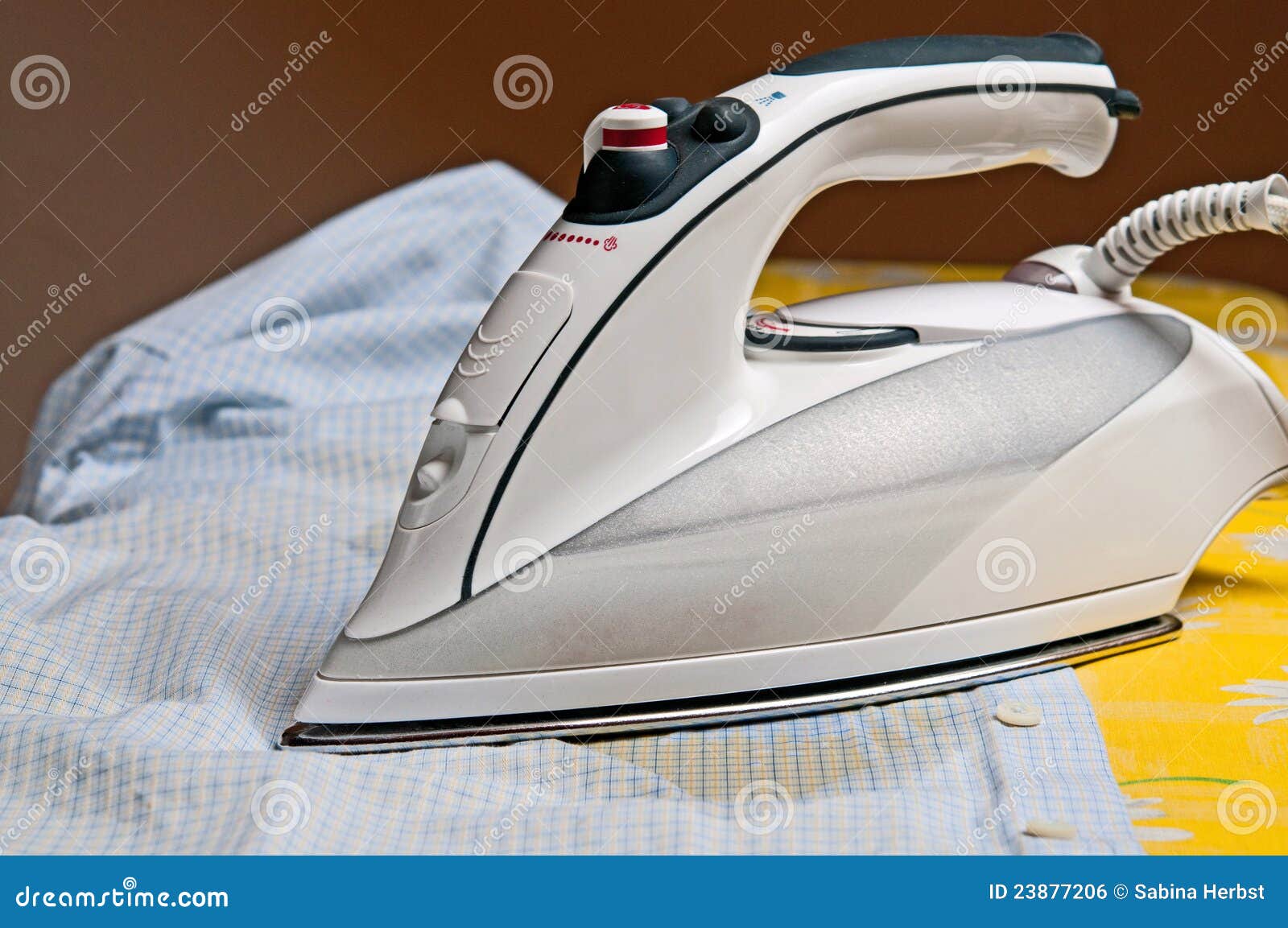 Ironing a shirt stock photo. Image of electic, task, ironing 23877206
