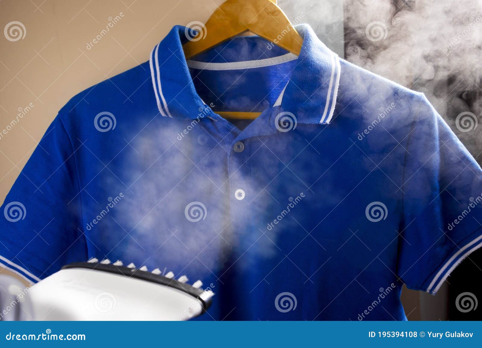 Ironing and Steaming Clothes with an Iron. Stock Photo - Image of shirt ...