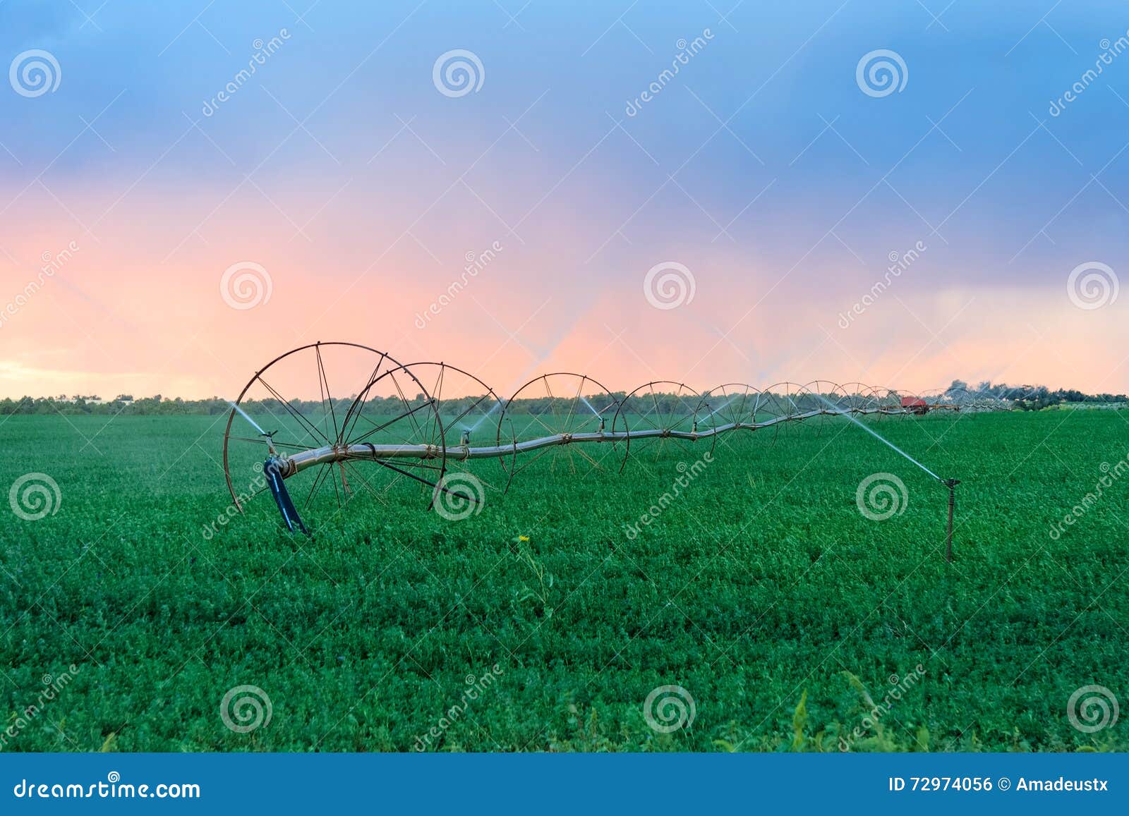 Irrigation Wheels at Farmlands Stock Photo Image of equipment