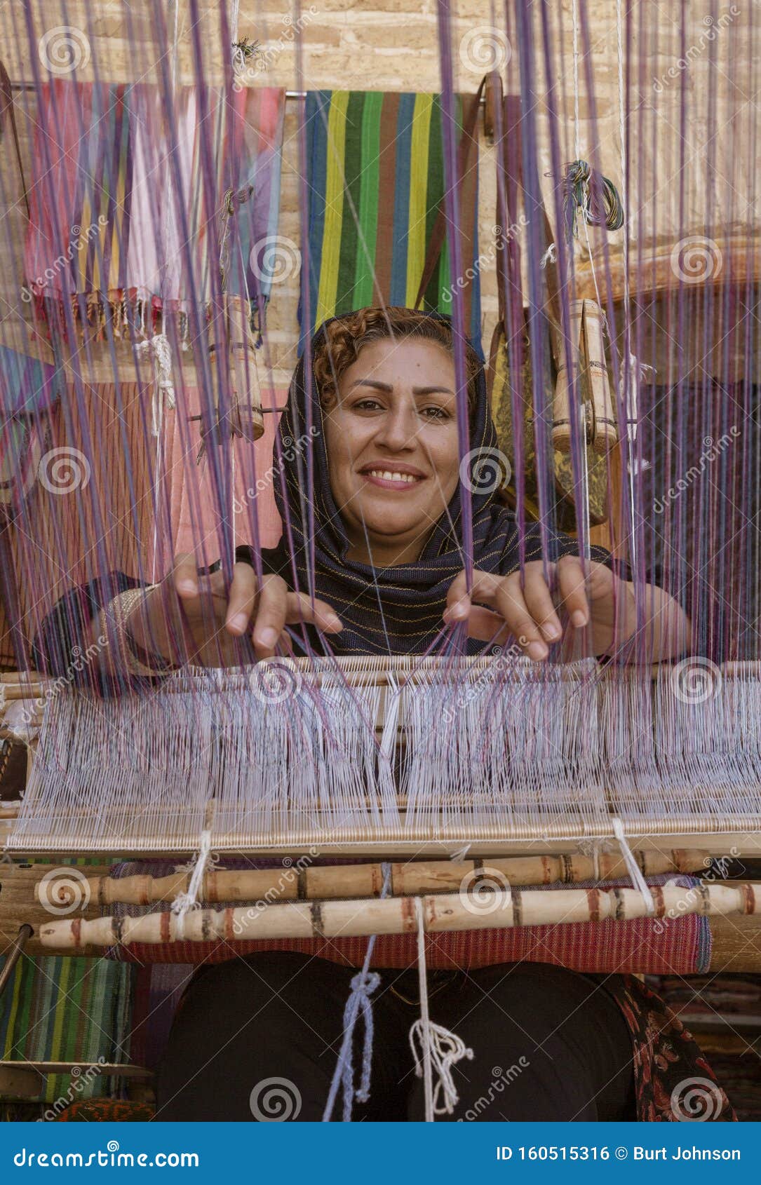 Isfahan, Iran - 2019-04-12 - Woman Weaves Cloth on a Hand Loom ...