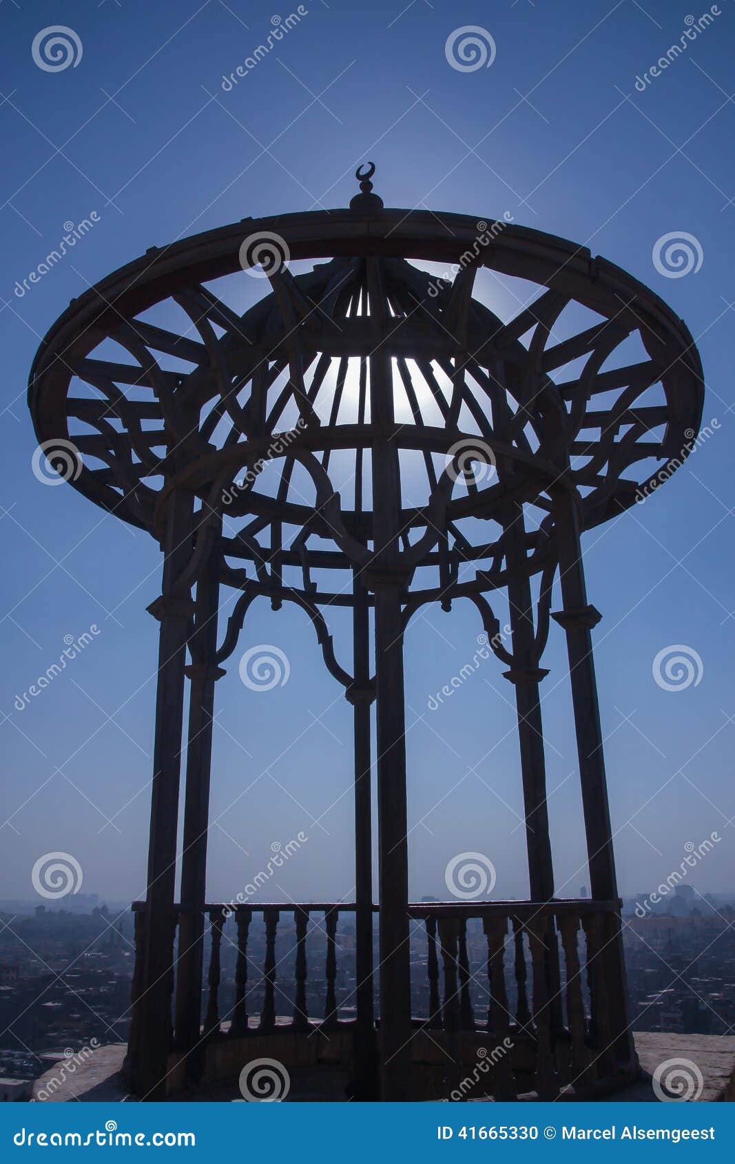 Islamic object with view over city in Egypt, close to an ancient mosque.