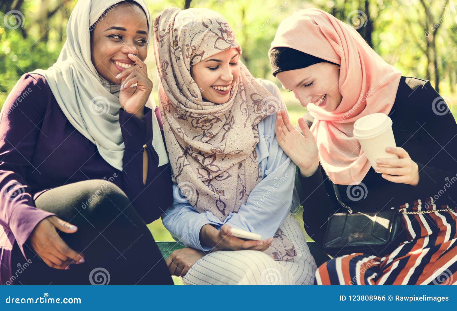 islamic women friends talking and having fun