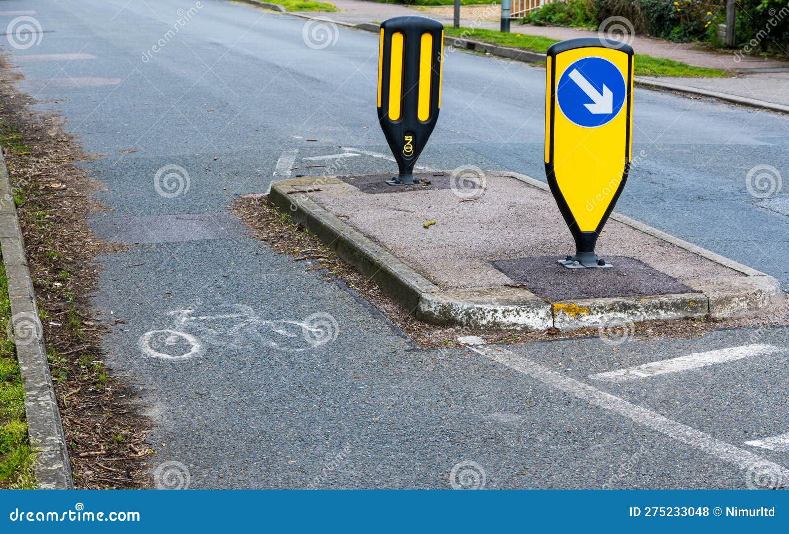 island and dedicated cycle route at traffic calming choke point