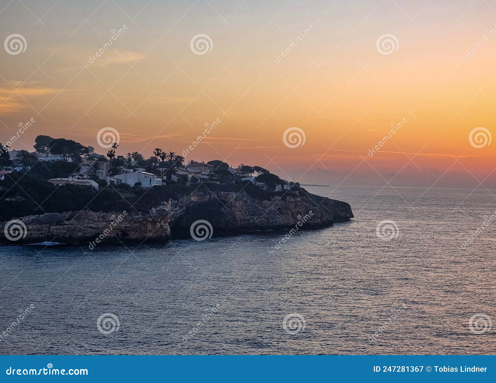 island in the mediterranien sea during sunrise