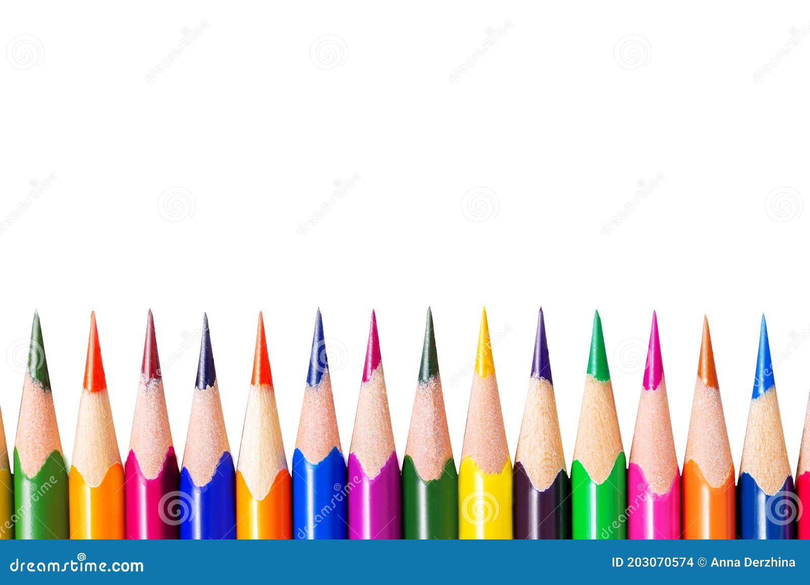 Isolated Down Border. Coloured Wooden Pencils. Closeup. Stock Photo