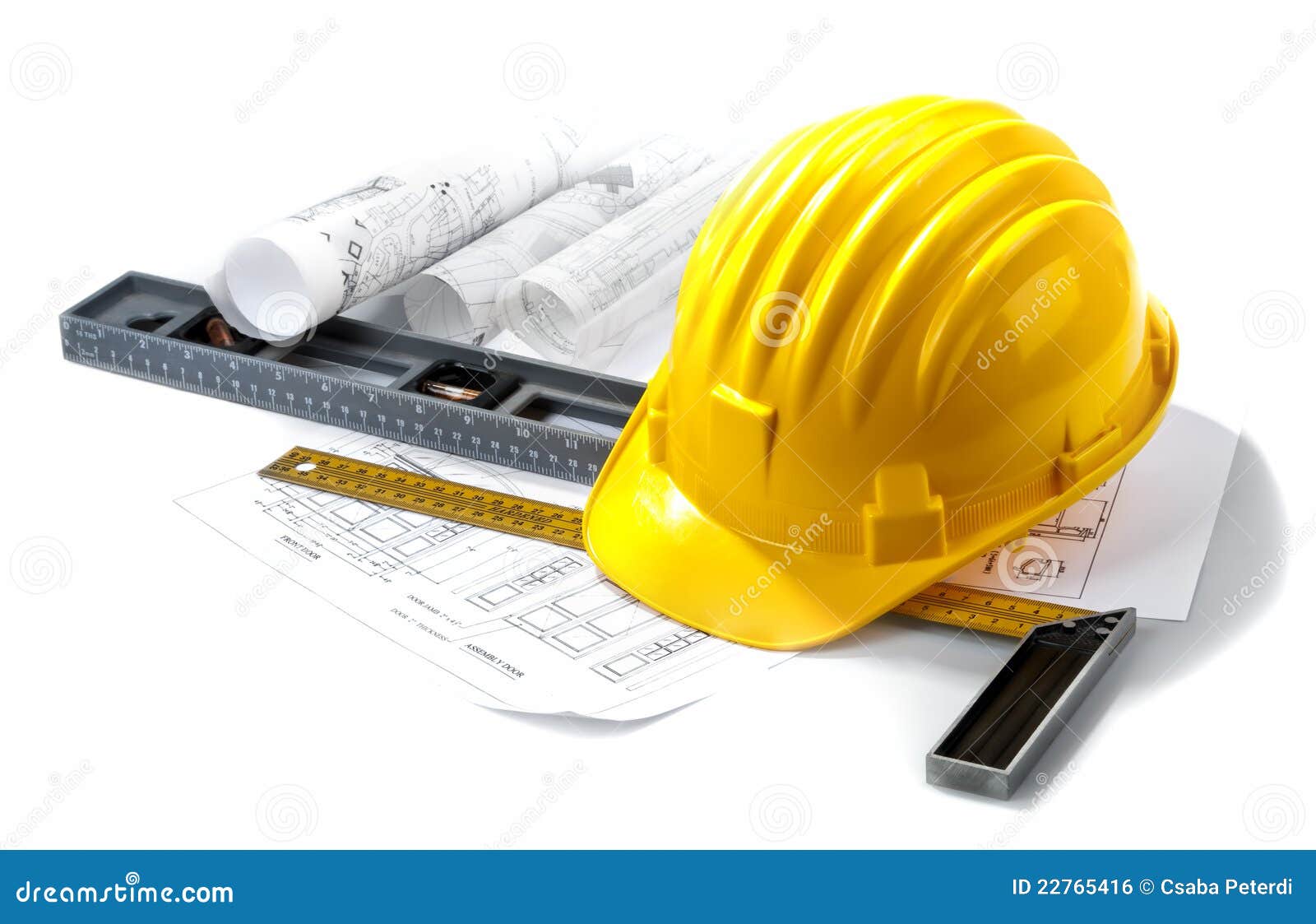  hard hat with blueprints and rulers