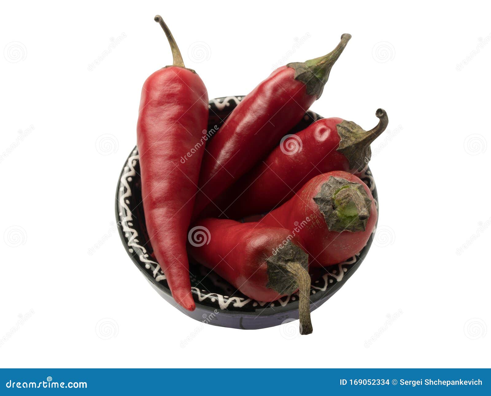  object: red hot chili pepper lying in a decorative cup