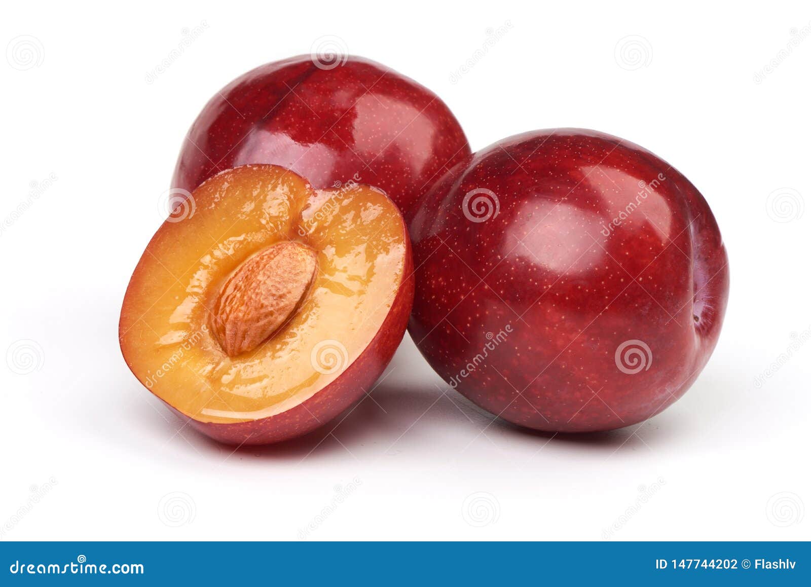  plums. one and a half of red plum fruit with leaves  on white background