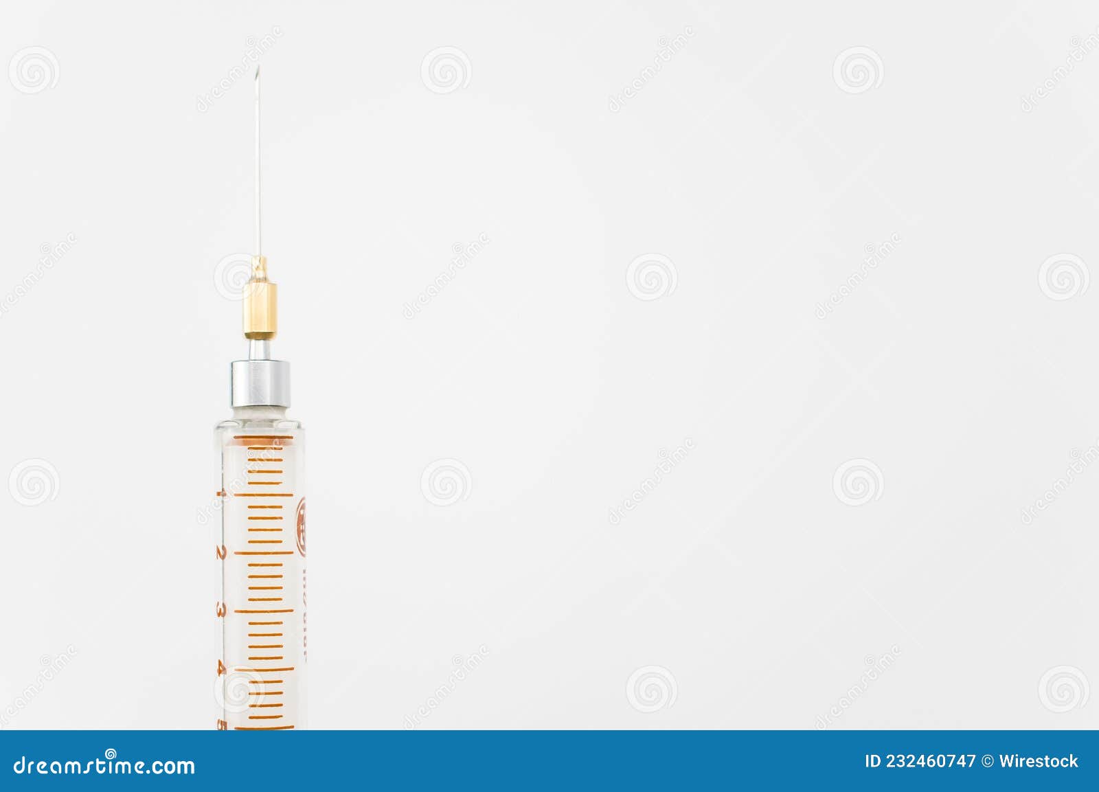 Isolated Sterilized Glass Injection Syringe on a White Paper Background