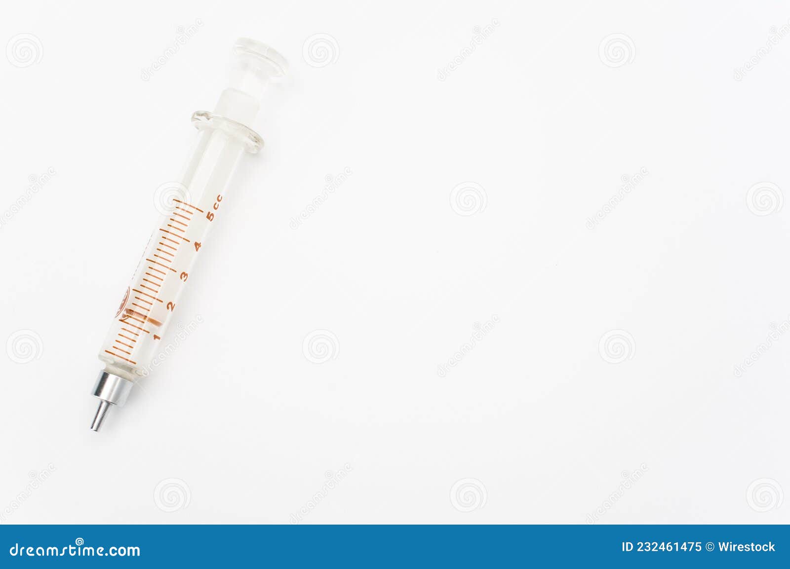 Isolated Sterilized Glass Injection Syringe on a White Paper Background