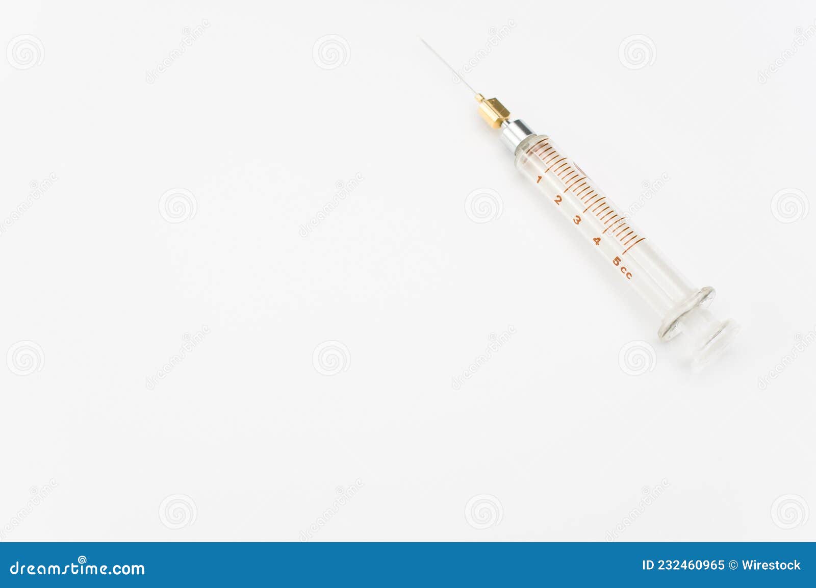 Isolated Sterilized Glass Injection Syringe on a White Surface Stock