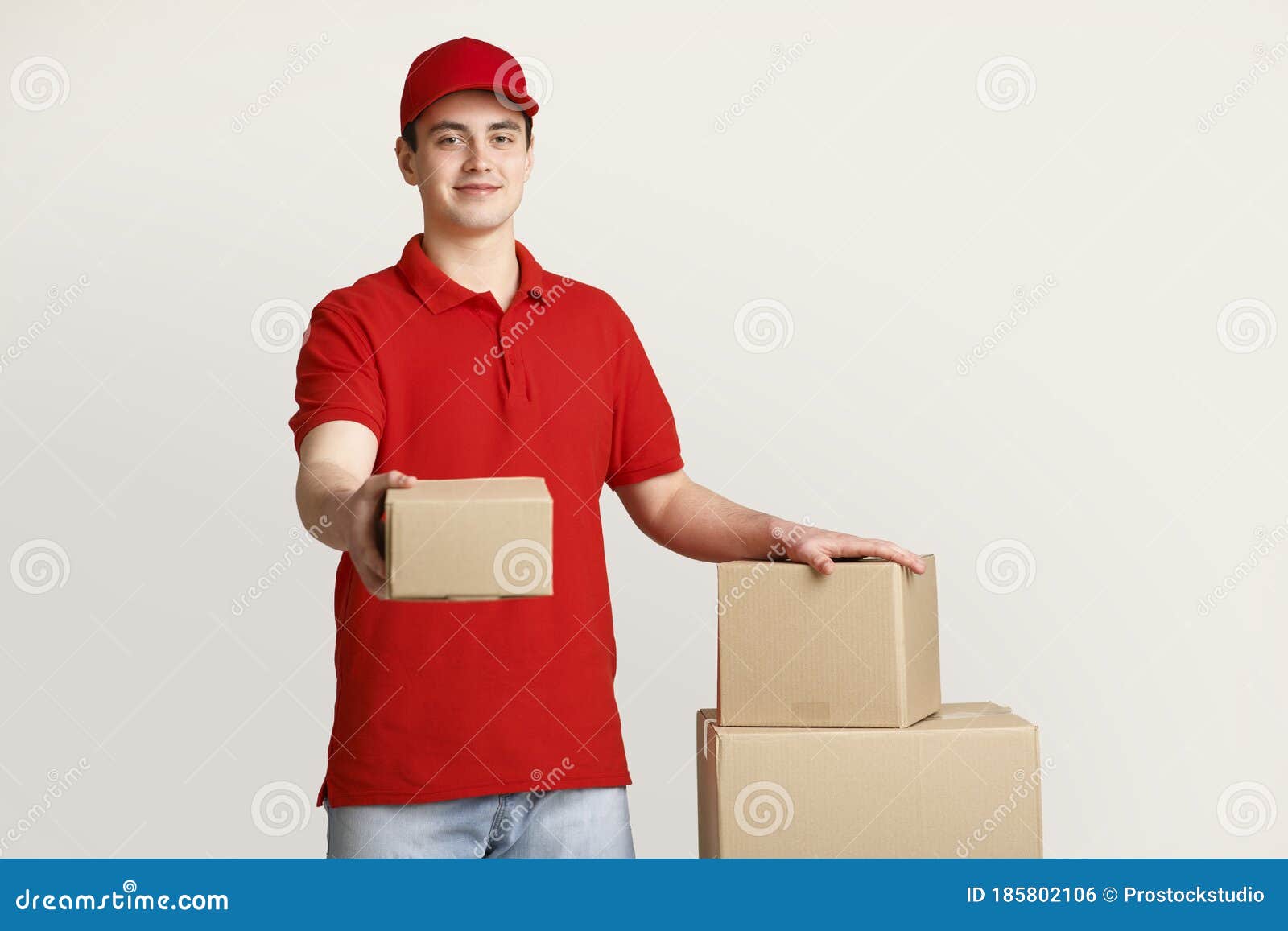 Issuance of Parcels at Post Office. Courier Holds Out Box and Puts His