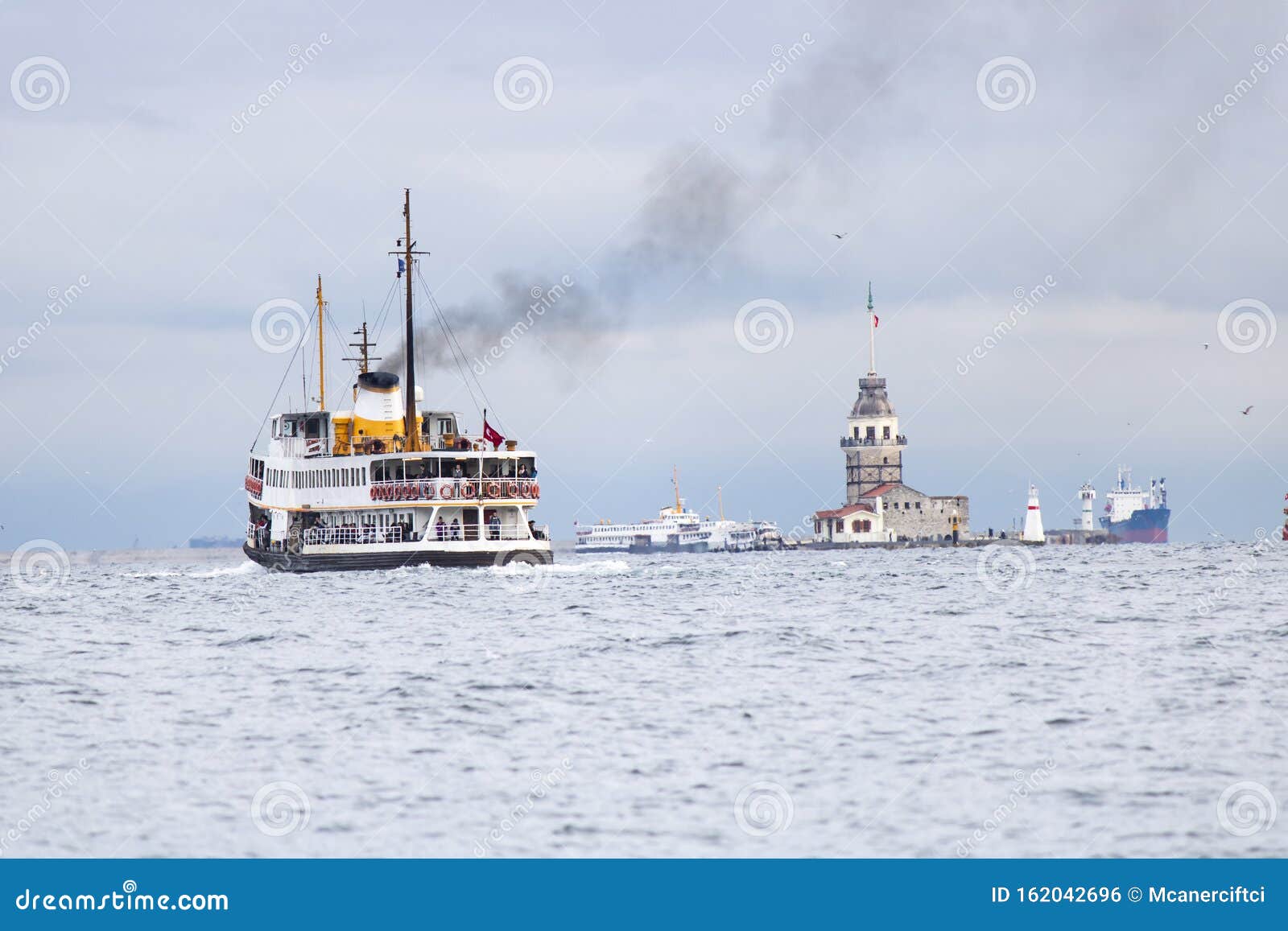 in istanbul, ferries operate on the bosphorus line. traditional old steamers. cloud weather in the background and the anatolian
