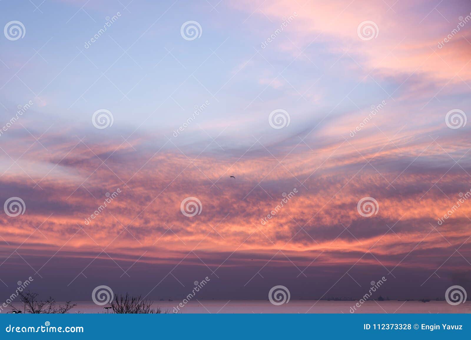 istanbul moda kadikoy sunset time. sky is purple, red and blue colours