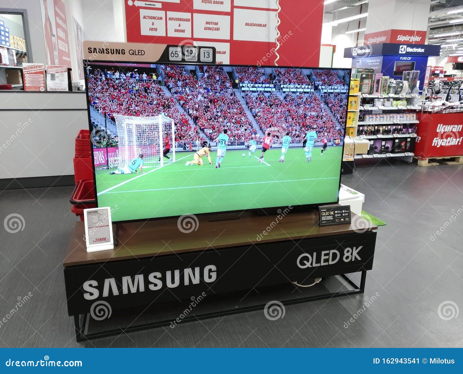 QLED 8K 65inch Smart TV on Display, Inside Markt Electronic at Editorial Photo - Image of entertainment, resolution: 162943541