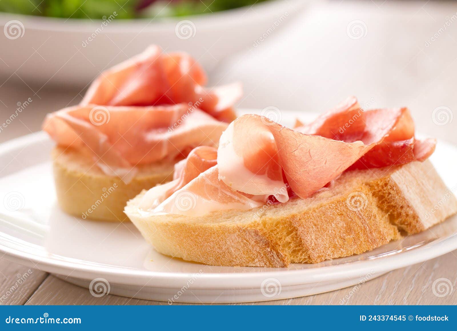 Italian Appetizer Bruschetta with Parma Ham on a Plate Stock Image