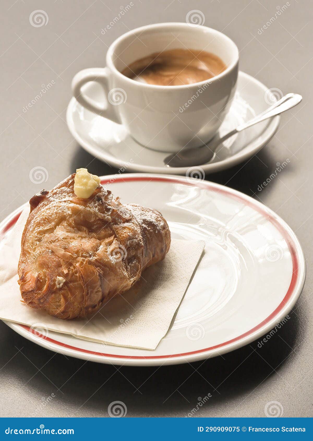 italian breakfast with croissant and cafe macchiato at coffee shop