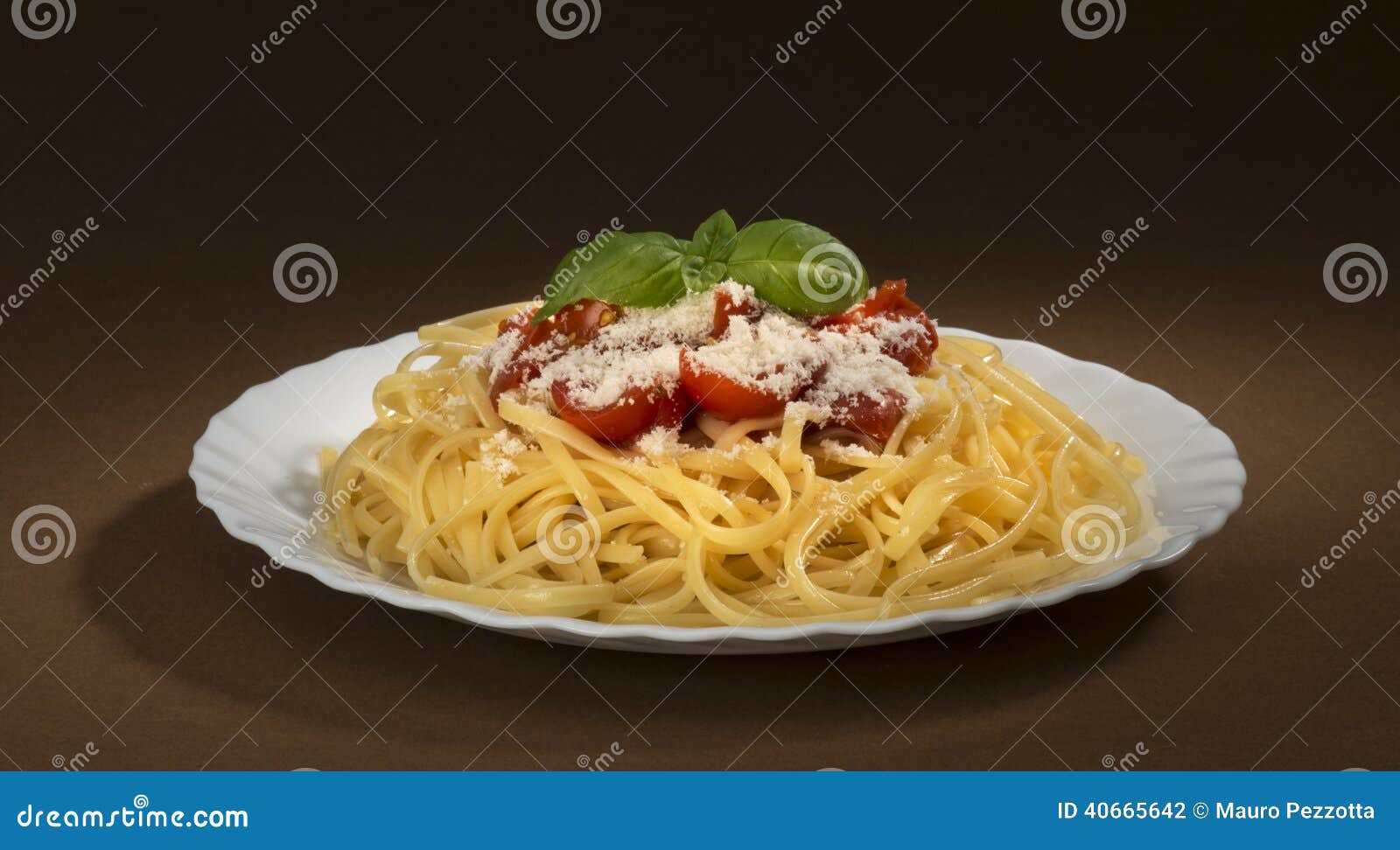 Italian cuisine. Dish with spaghetti and tomato souce