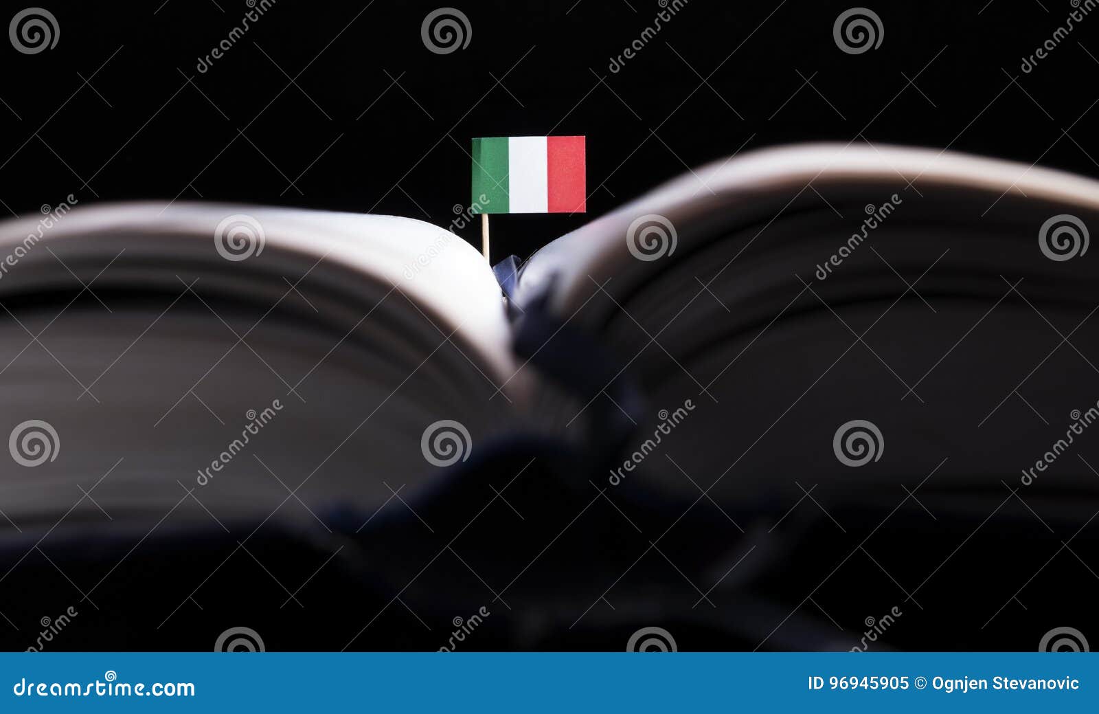 Italian Flag in the Middle of the Book. Knowledge and Education Stock ...