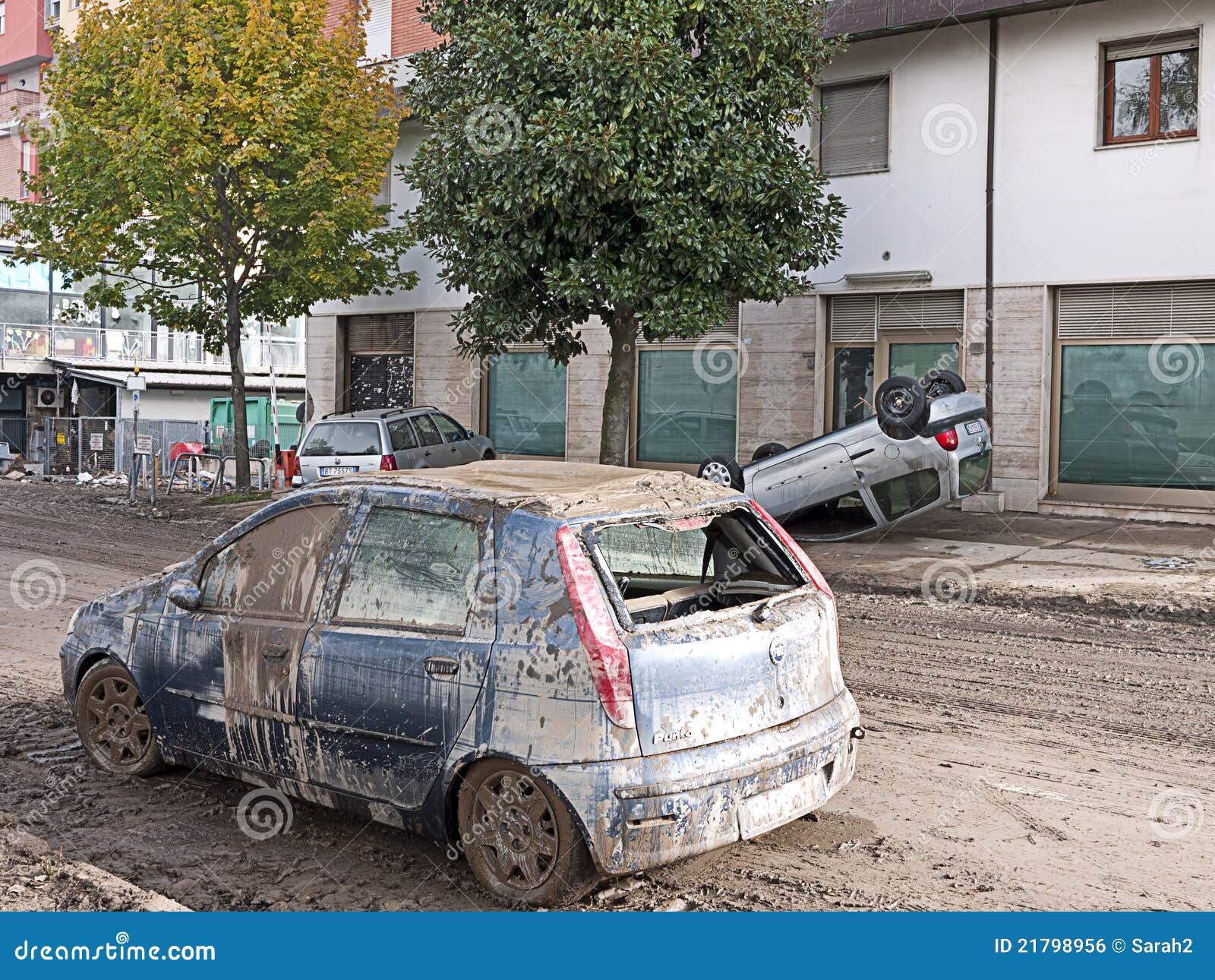 italian-floods-aftermath-upturned-car-write-off-21798956.jpg