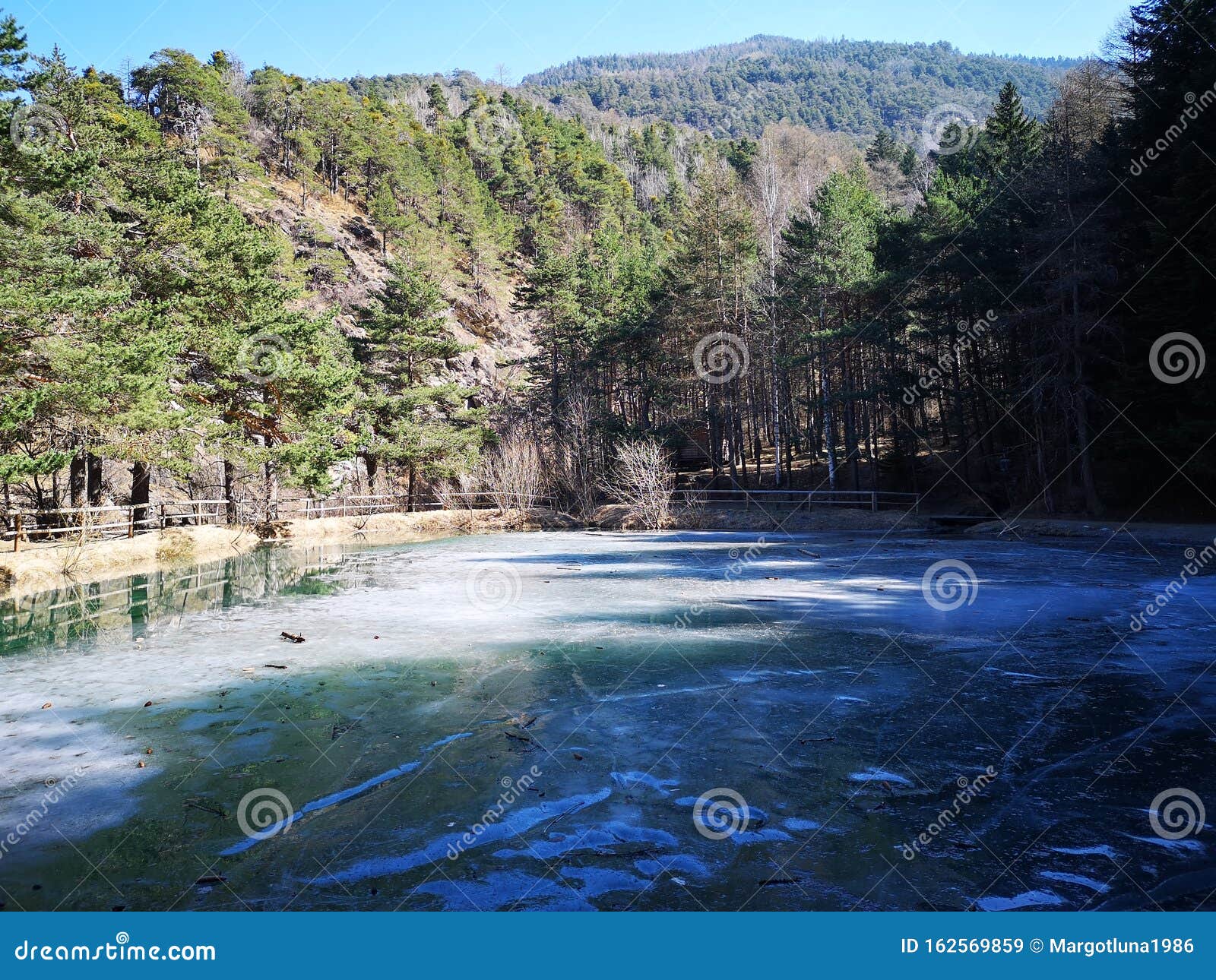 frozen mountain lake in susa valley