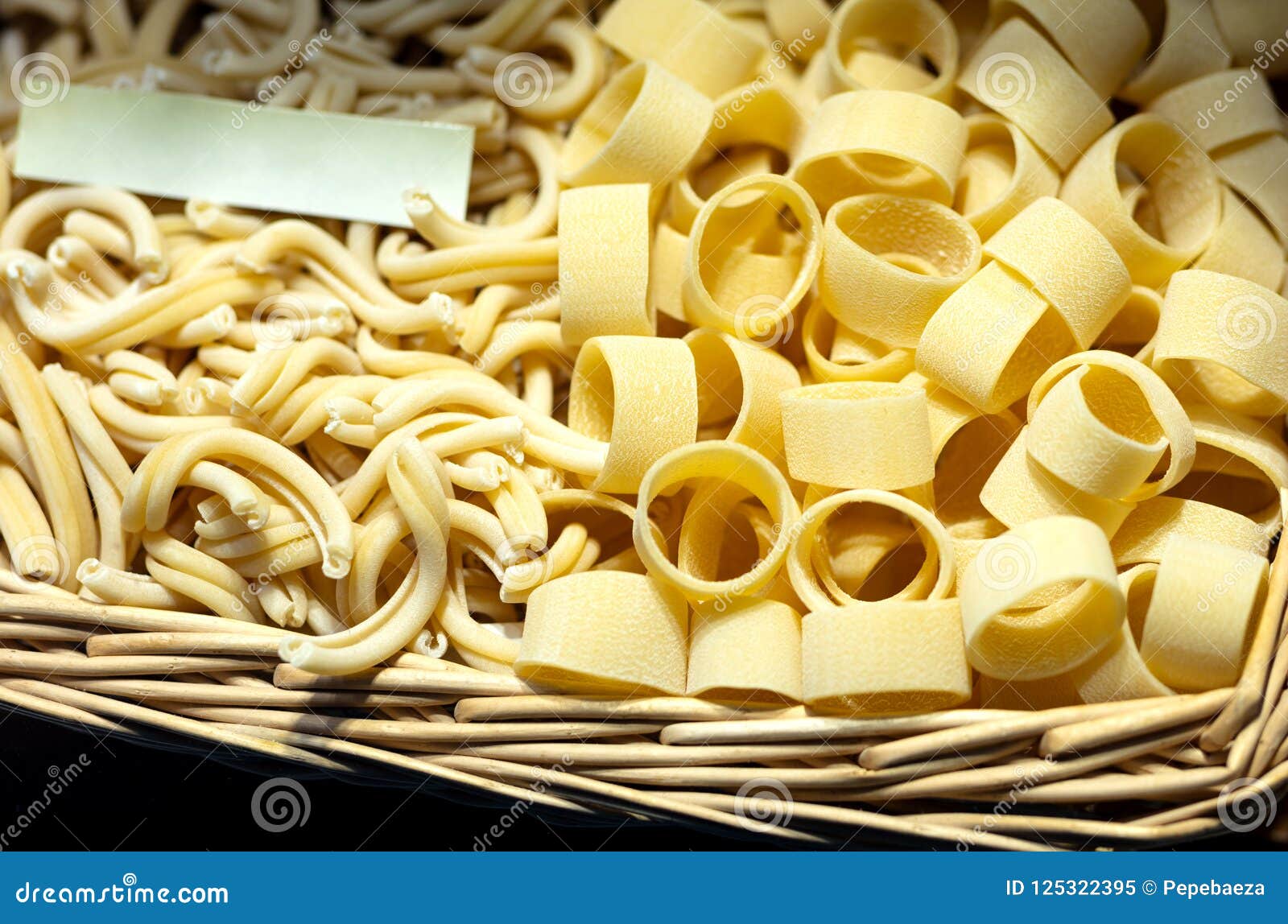 Italian pasta in a basket stock image. Image of italy 125322395