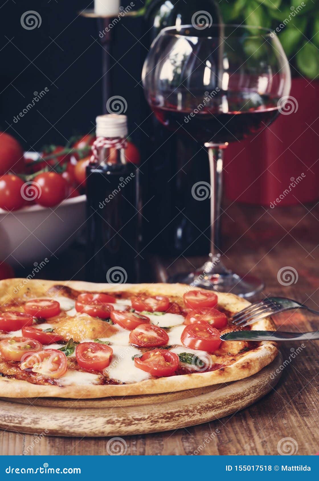 Italian Pizza with Mozzarella, Tomatoes and Basil Stock Photo Image