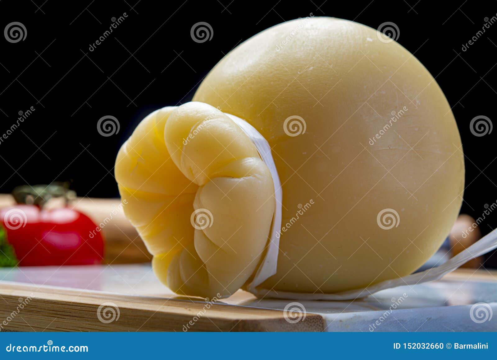 Italian Provolone or Provola Caciocavallo Hard and Smoked Cheeses in  Teardrop Form Served on White Marble Plate Close Up Stock Photo - Image of  provola, straddled: 152032660