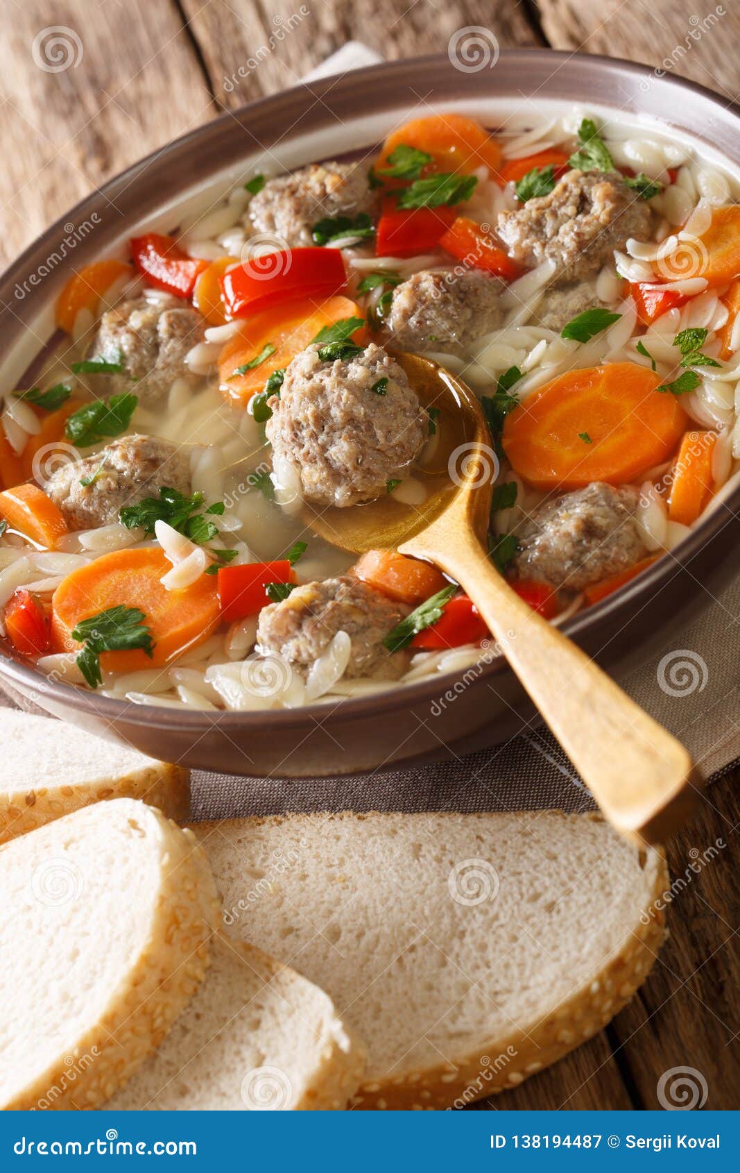 Italian Wedding Soup with Orzo Pasta, Meatballs and Vegetables Close-up ...