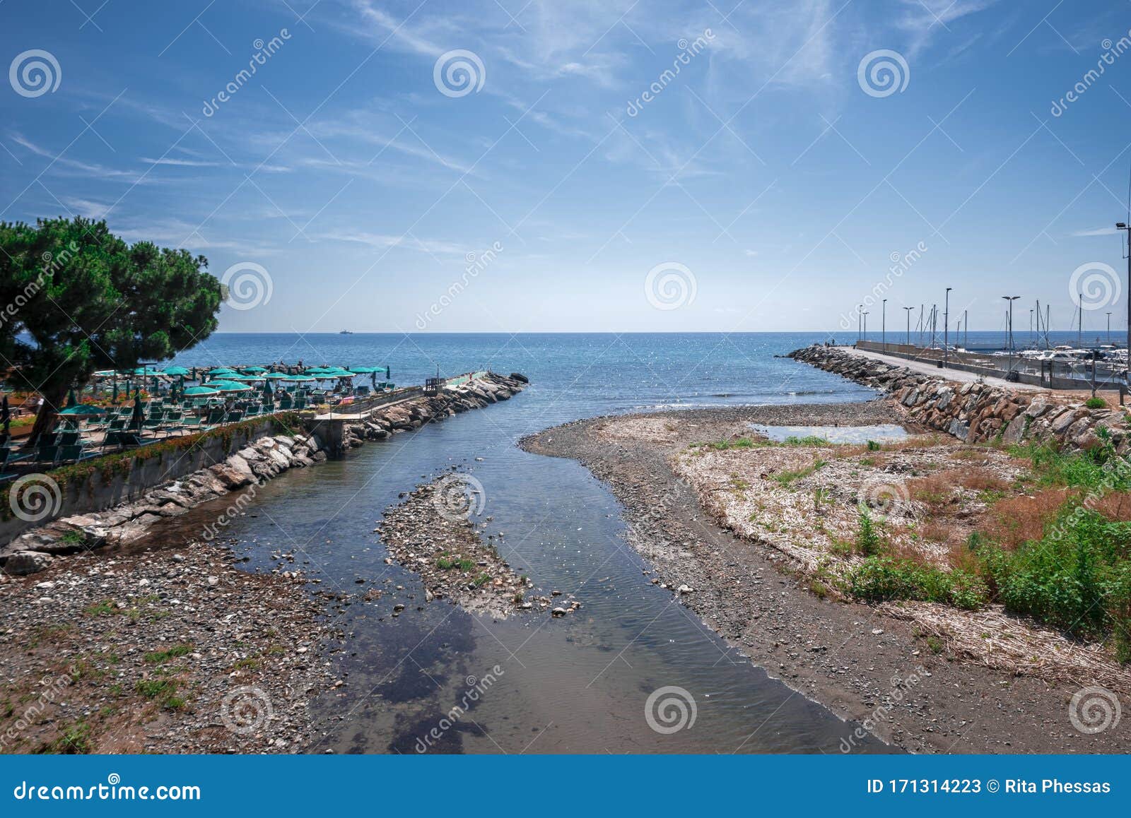 View of a Mediterranean Landscape Where a Wide River Flows into the Sea ...