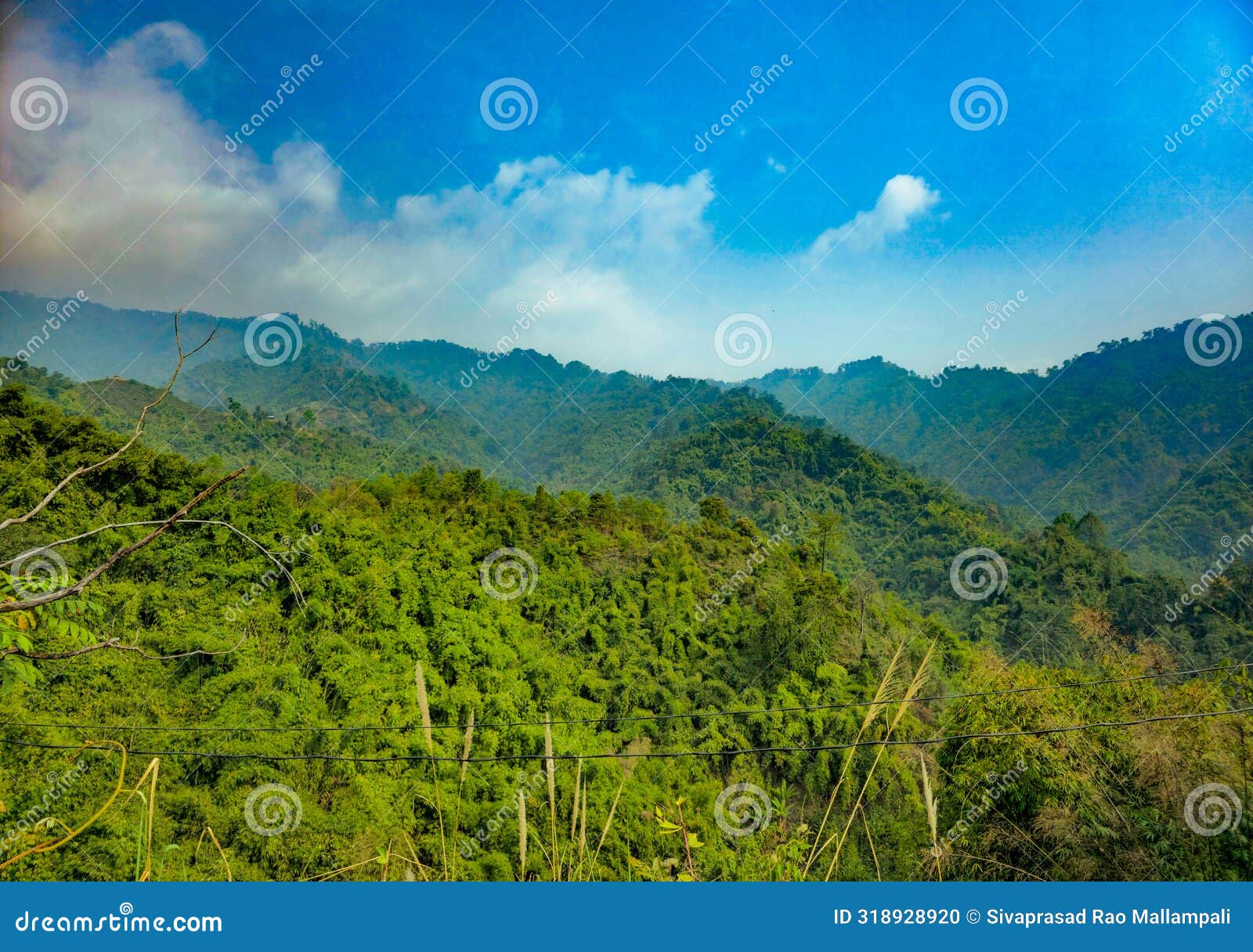 scenic green mountains against the backdrop of beautiful sky in itanagar wildlife sanctuary, arunachal pradesh, india.