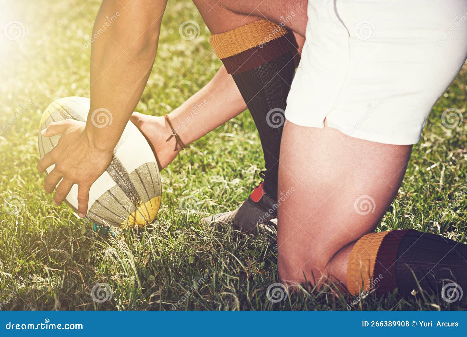 Its All about the Placement. a Rugby Player Placing the Ball for a Kick