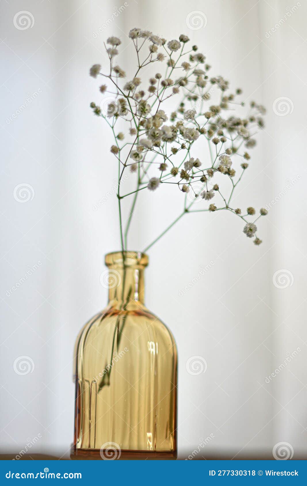 a glass bottle of flower