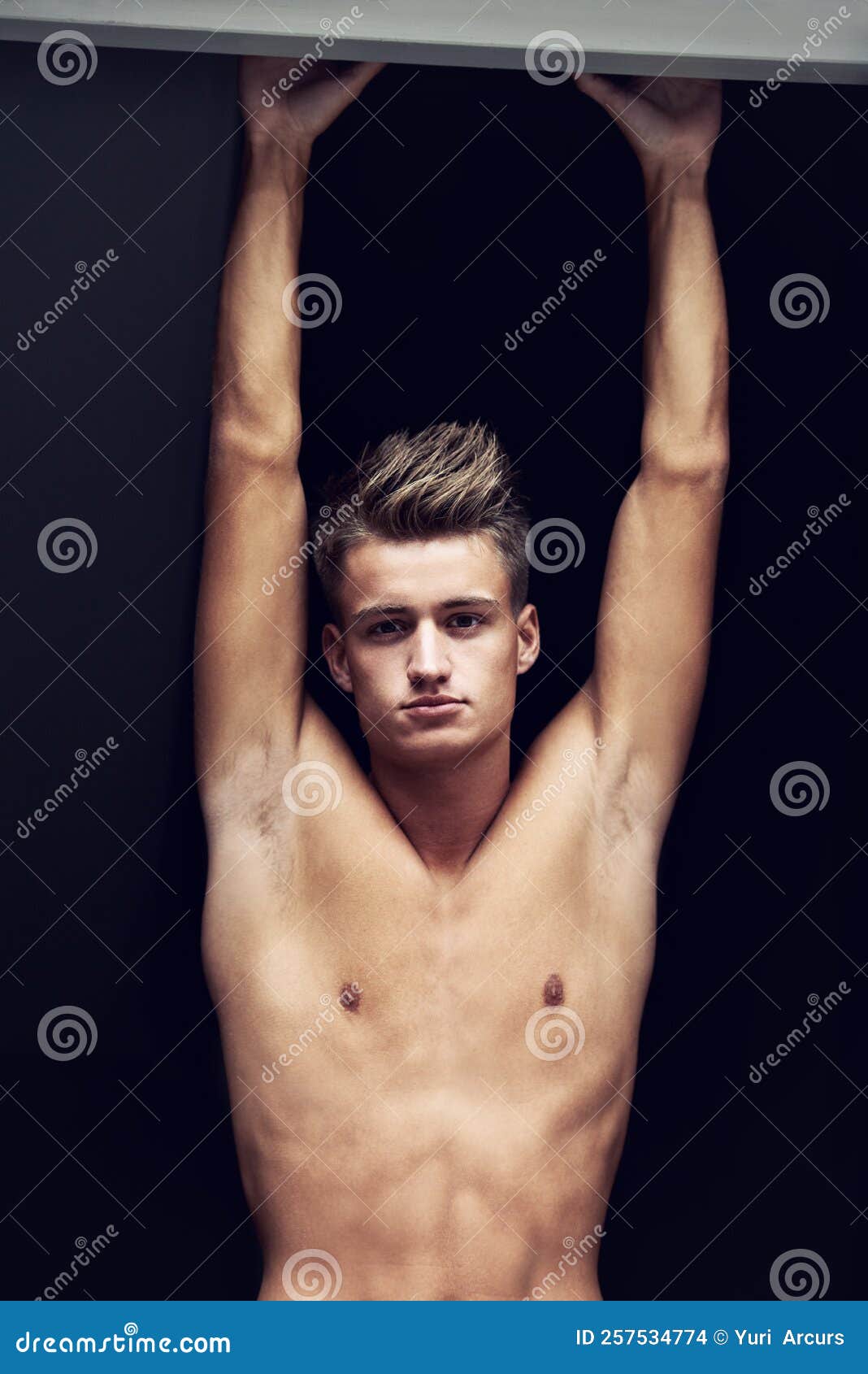 Handsome Barechested Soldier Is Holding A Rifle Stock Photography 39173828
