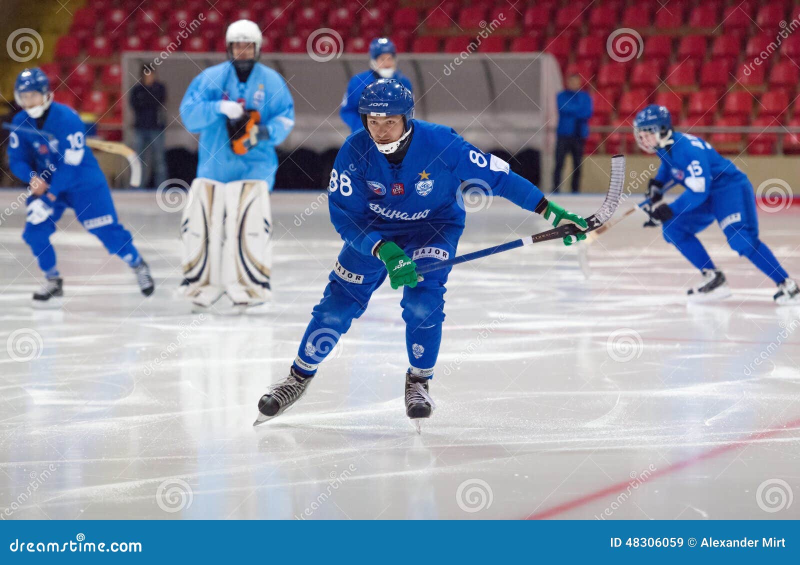 MOSCOW - DECEMBER 12, 2014: Ivanushkin Eugeny (88) in action just before the Russian bandy league game Dynamo Moscow vs SKA Neftyanik in sport palace Krilatskoe, Moscow, Russia. Dynamo won 9:1