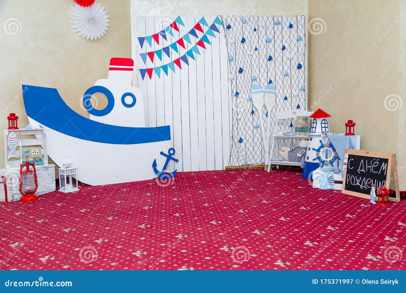 Thematic Sea Birthday Party with Wooden Ship, Flags, Sea Shells,  Lighthouse, Steering Wheel Toy, Paddles and Soft Cat in Stripy T- Stock  Image - Image of event, izmail: 175371997