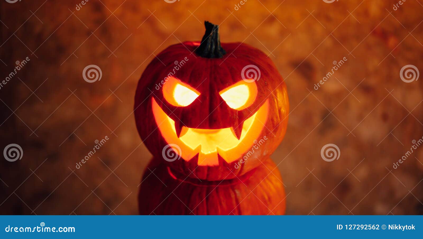Jackolantern Pumpkin Orange Light, Halloween Background Stock Photo