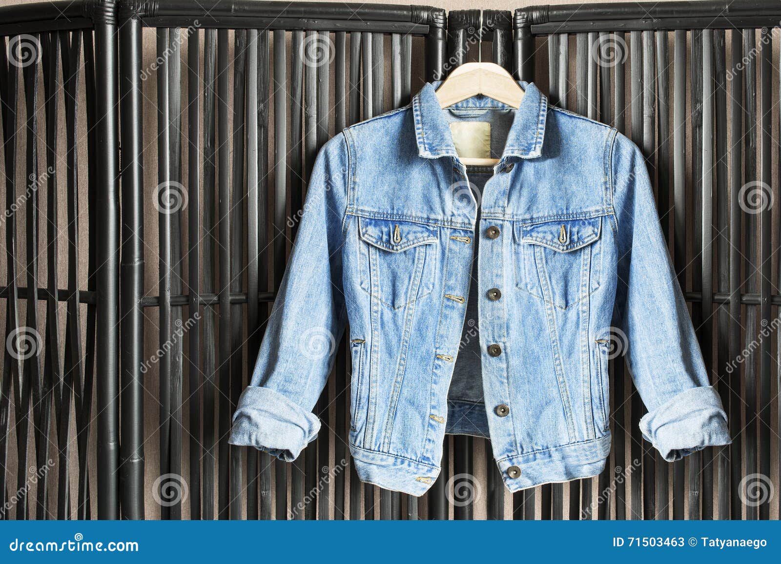 Jacket on clothes rack stock image. Image of fashionable 71503463