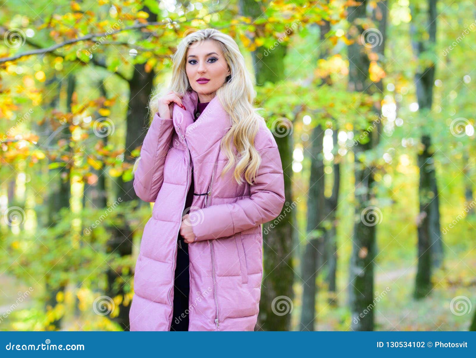 Jackets Everyone Should Have. Girl Fashionable Blonde Walk in Park ...