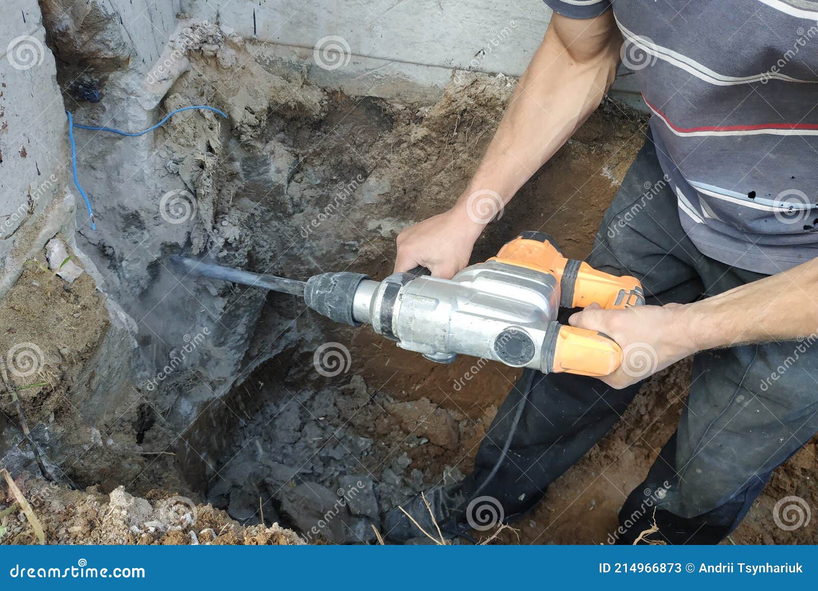 Jackhammer in Action, Pneumatic Construction Tool, Drilling a Hole in